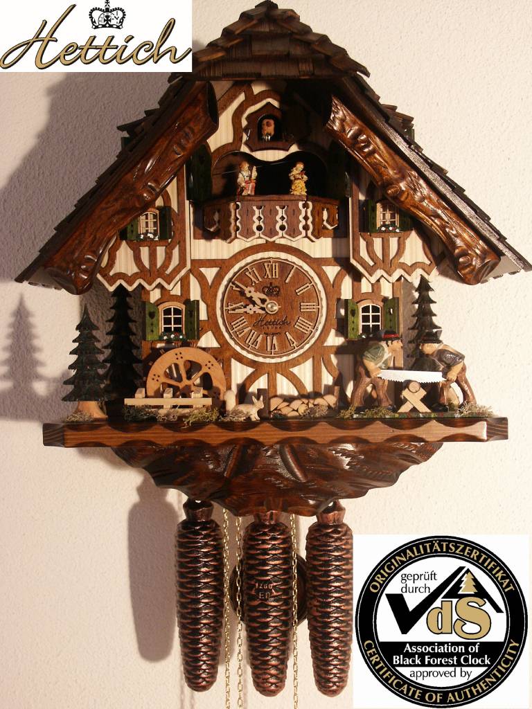 Reloj de cuco originalmente hecho a mano en el estilo de la casa de la  Selva Negra, 40 cm de alto con figuras móviles de danza de doble sierra y  rueda de