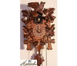 Hettich Uhren Cuckoo clock with quartz movement 23cm high and 18cm wide with 12 different melodies cuckoo calls every hour cuckoo eg 10 o'clock he calls 10x cuckoo the cuckoo call is ef through an echo and a waterfall sound in the background