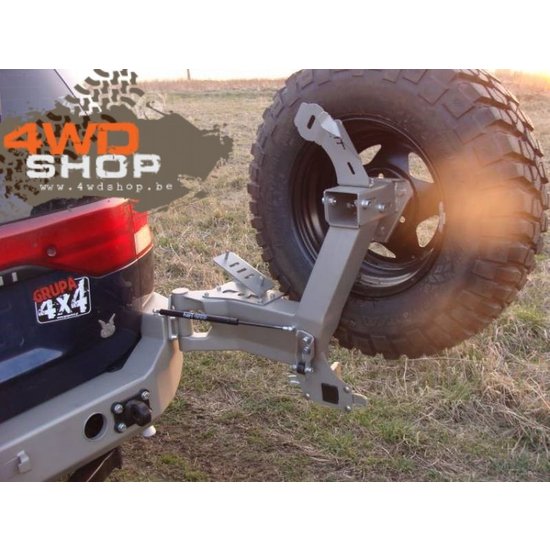 F-4X4 MITSUBISHI PAJERO SPORT 96-00  RESERVEWIEL BEVESTGING