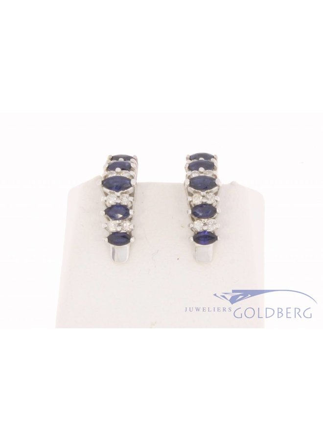 Vintage 18 carat white gold ear clips with ca. 0.24ct brilliant cut diamond and blue sapphire