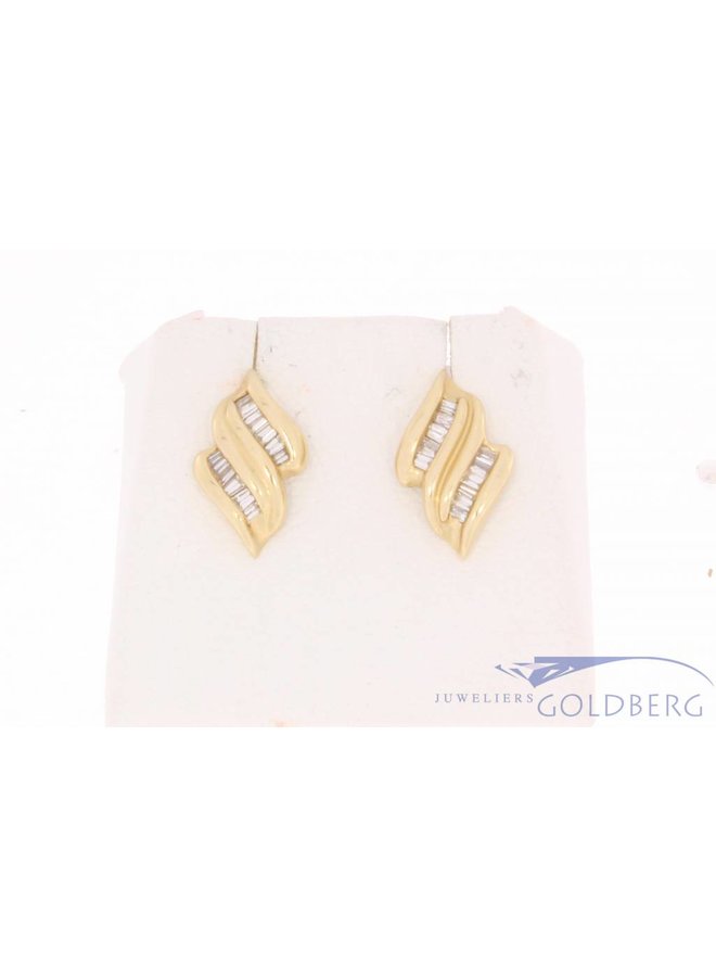 Vintage 14 carat gold earstuds with ca. 0.45ct baguette cut diamond