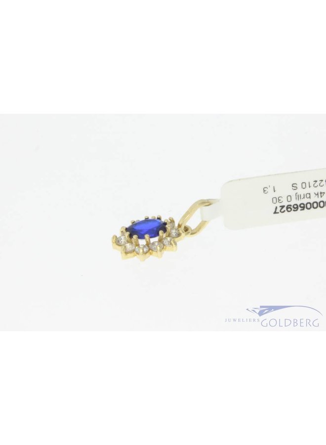 Vintage 14 carat gold pendant with blue spinel and approx. 0.30ct brilliant cut diamond