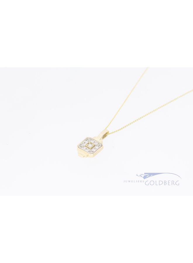 14k gold pendant from our own design and finish