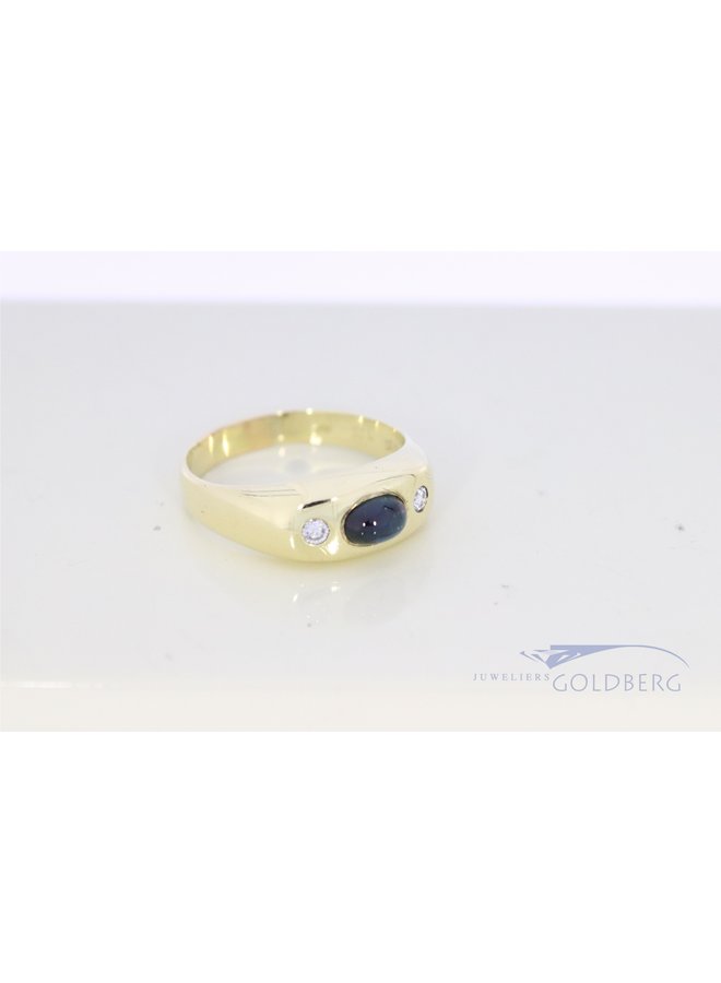 14k gold ring with cabochon sapphire and 2x diamonds