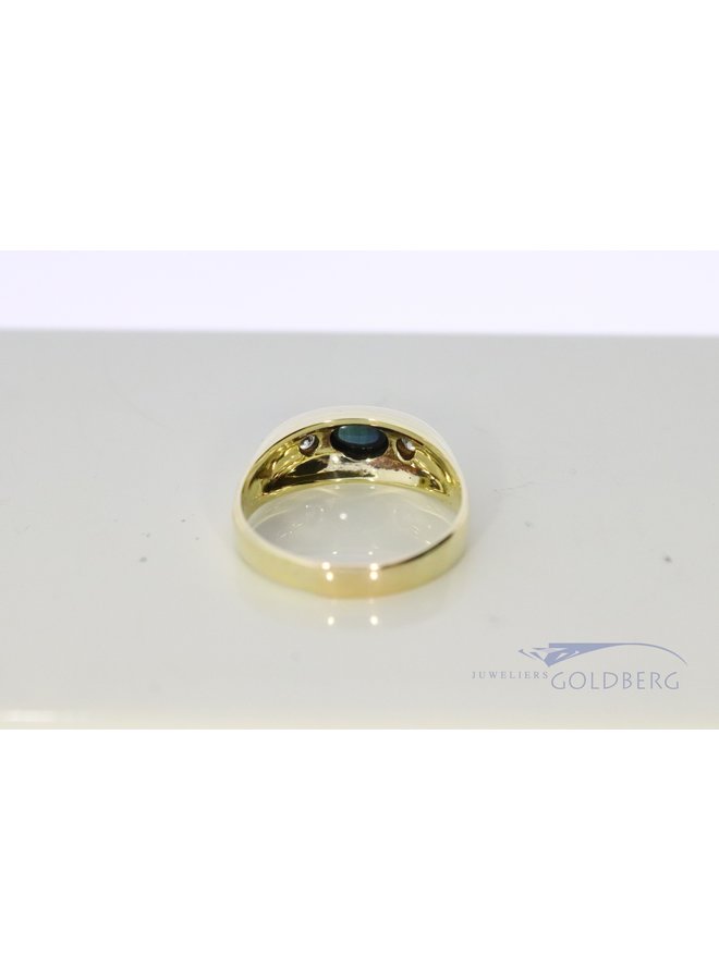 14k gold ring with cabochon sapphire and 2x diamonds