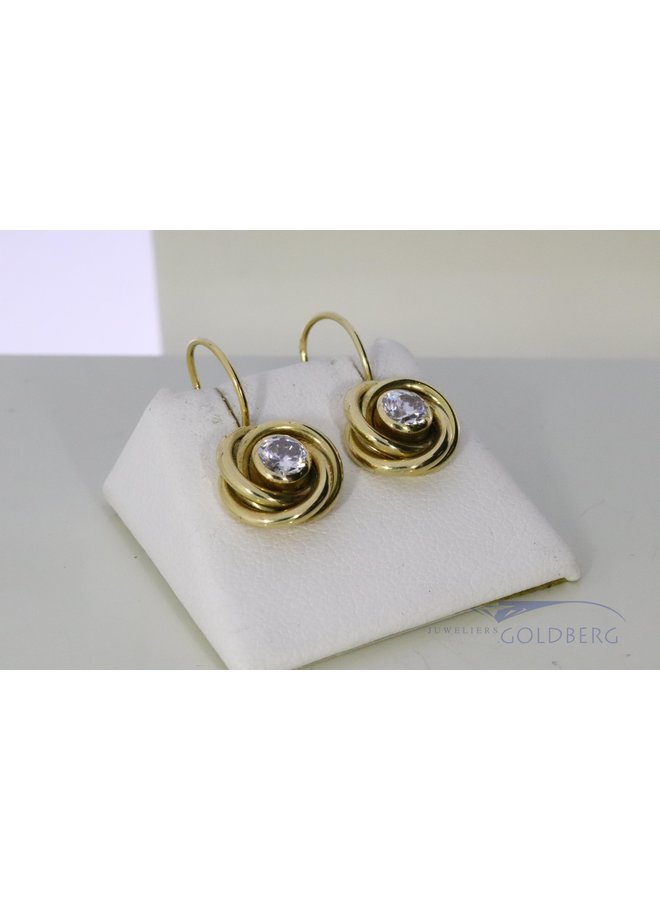 14k gold earrings with zirconia.