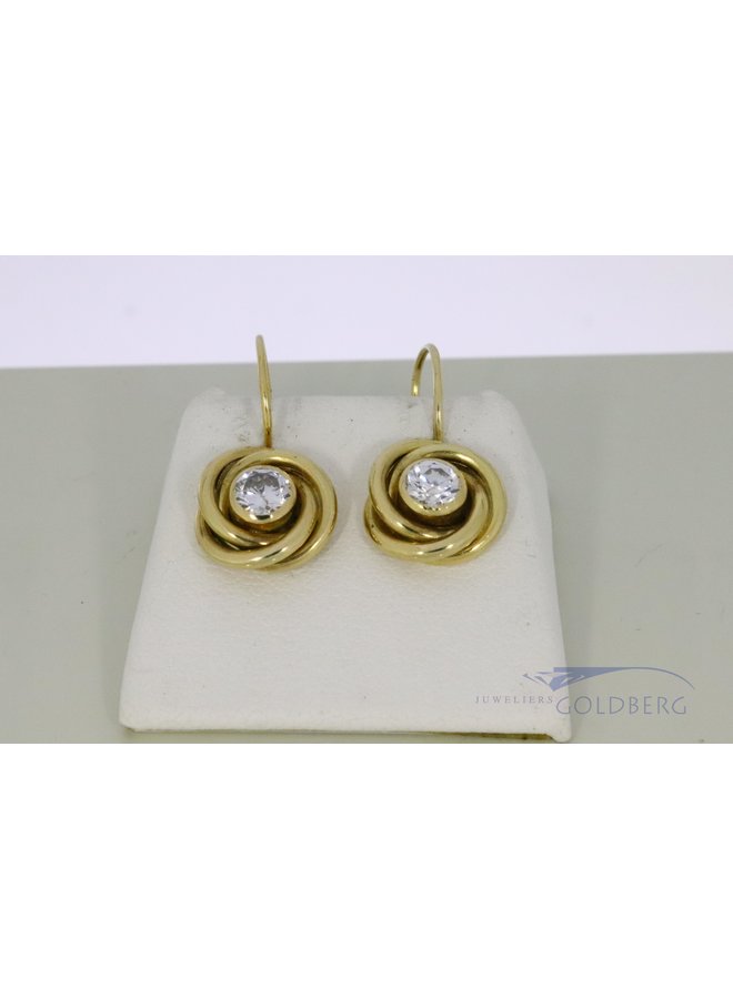 14k gold earrings with zirconia.