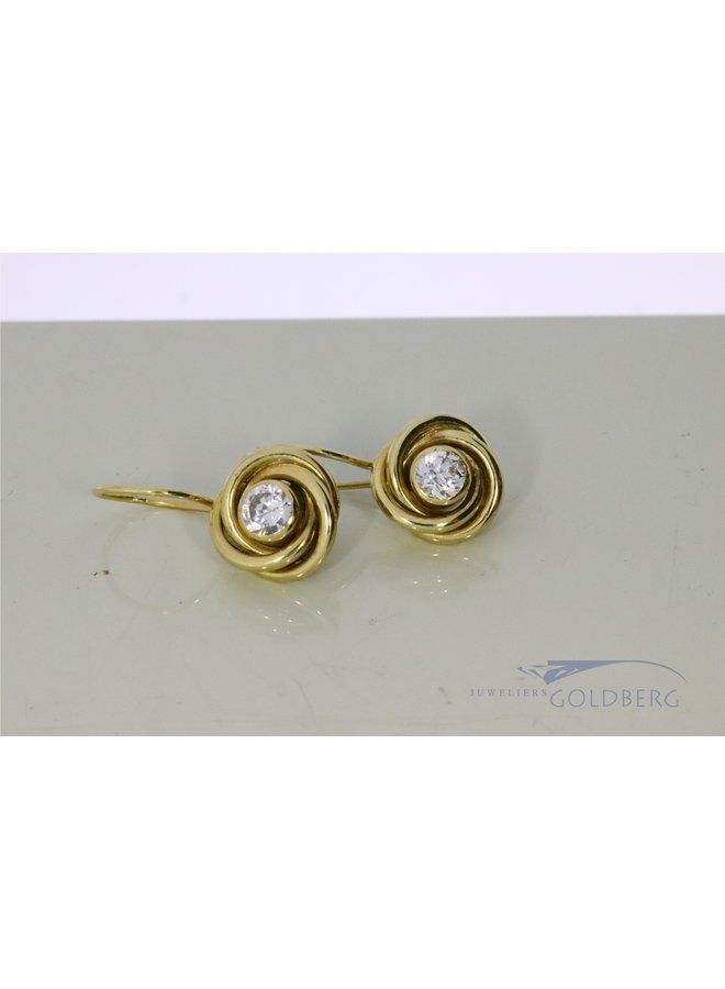 14k gold earrings with zirconia.