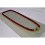 blood coral bead necklace with 14k gold clasp.