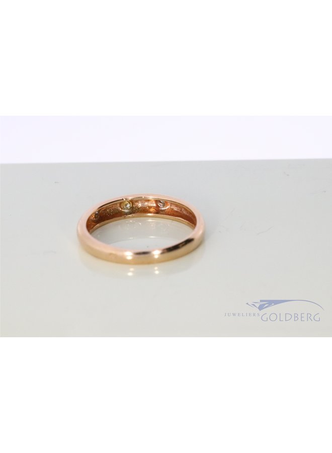 red gold ring with 3x diamonds