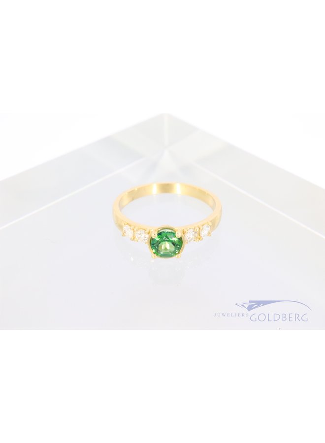 14k gold "cup ring" with green topaz and diamonds from our workshop