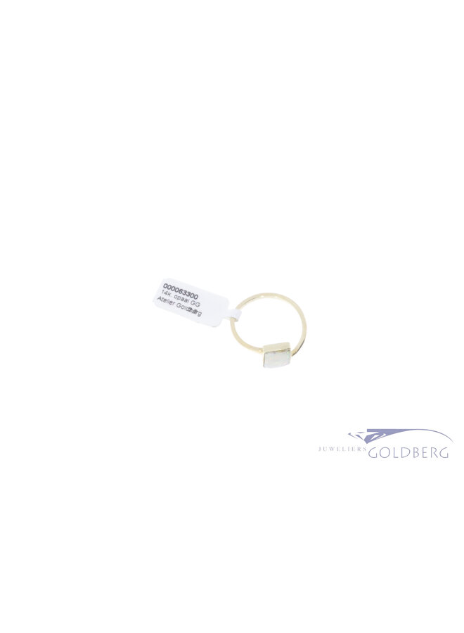 14k gold ring with opal from our own studio