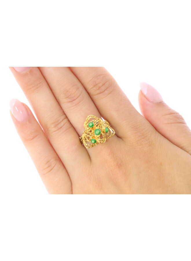 18k filigree ring with green enamel balls.