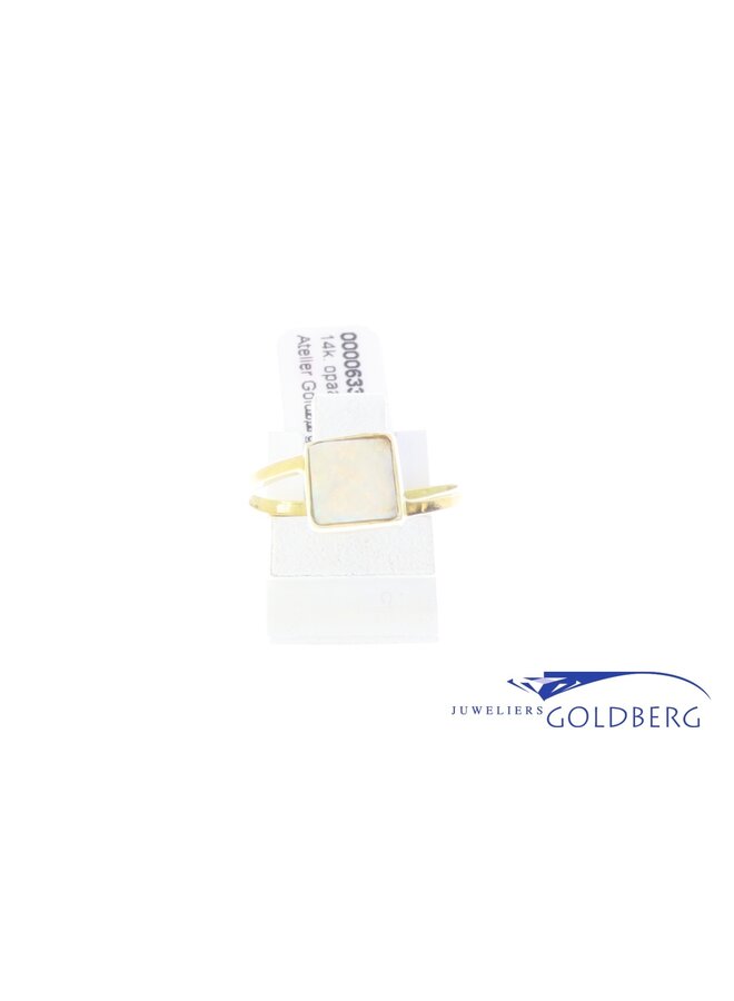 14k gold ring with opal from our own studio