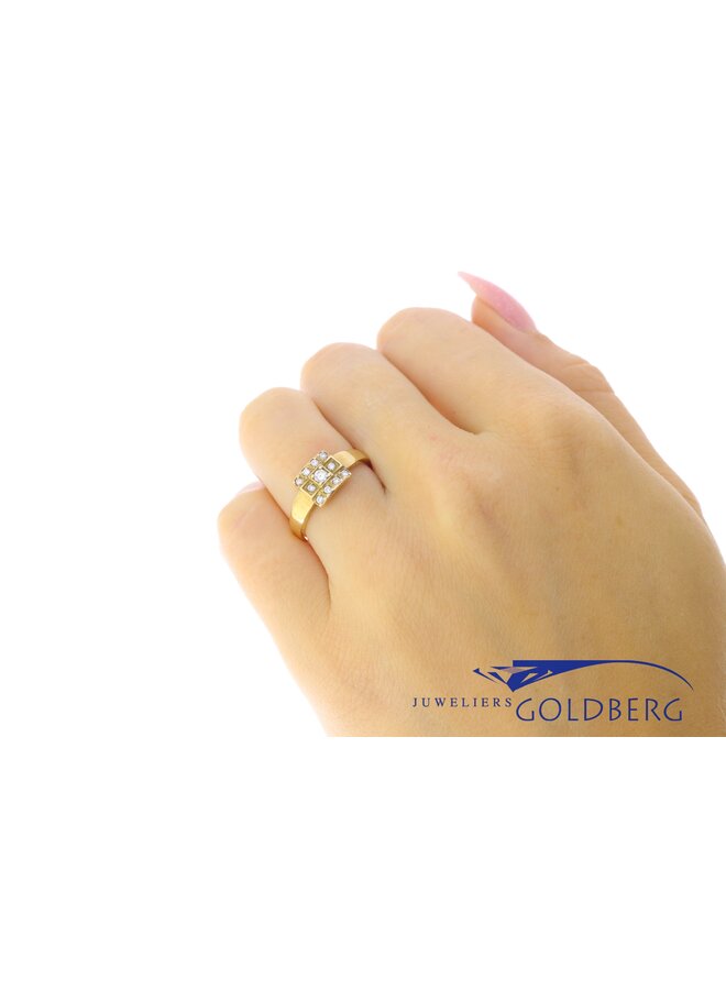 14k gold Goldberg design ring with 0.14ct diamond