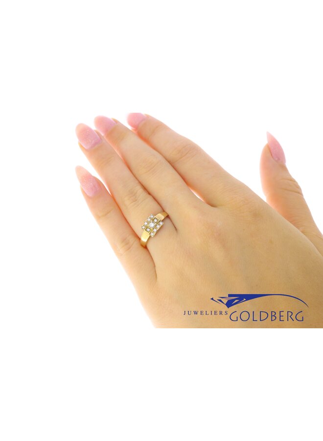 14k gouden Goldberg design ring met 0.14ct briljant