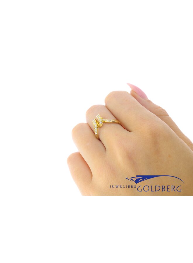 Vintage 14k gouden gekrulde ring met ca. 0.17ct briljant