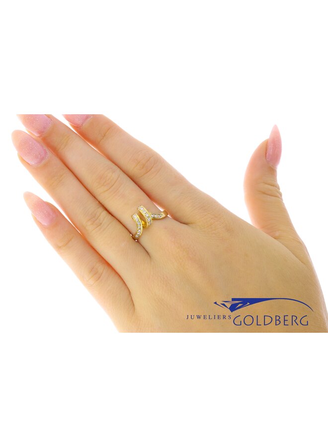 Vintage 14k gouden gekrulde ring met ca. 0.17ct briljant