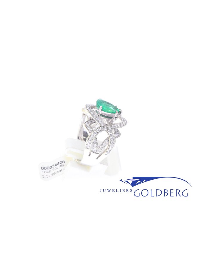 white gold ring with 2.30ct pear cut emerald and diamonds
