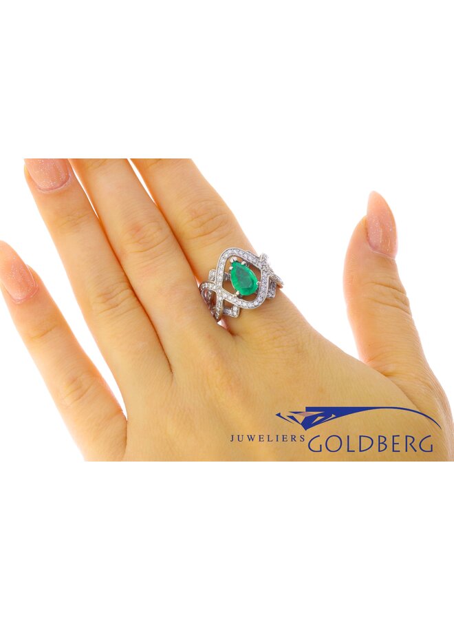 white gold ring with 2.30ct pear cut emerald and diamonds