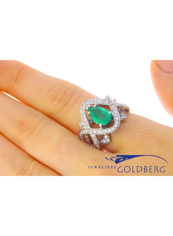 white gold ring with 2.30ct pear cut emerald and diamonds
