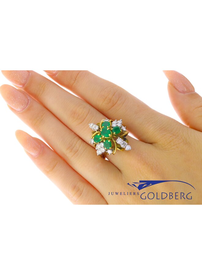 Beautiful 18k yellow gold ring with 5 emeralds and 18 diamonds.