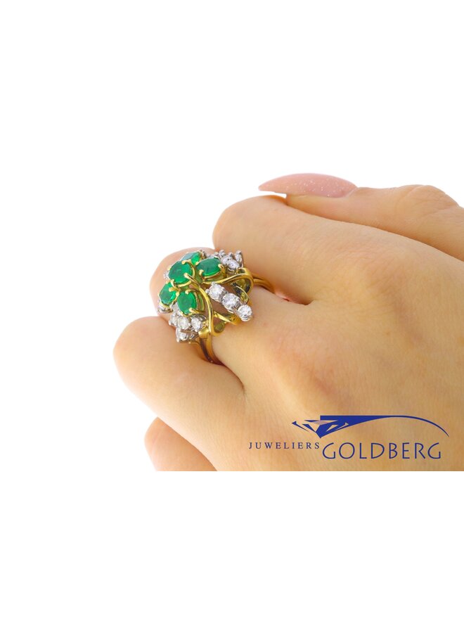 Beautiful 18k yellow gold ring with 5 emeralds and 18 diamonds.