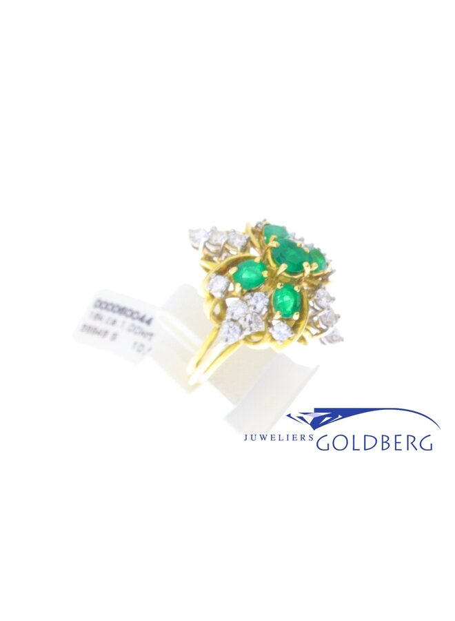 Beautiful 18k yellow gold ring with 5 emeralds and 18 diamonds.