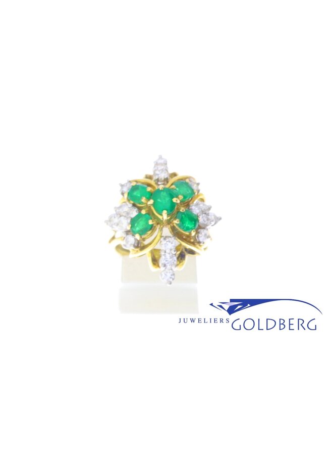 Beautiful 18k yellow gold ring with 5 emeralds and 18 diamonds.