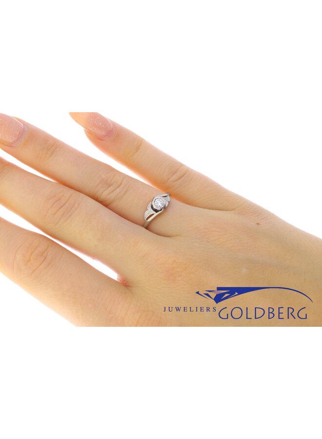 Vintage 18k gouden & platina ring met ca. 0.10ct briljant