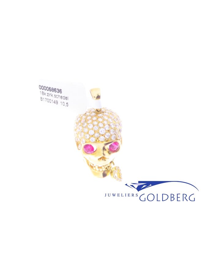 18k gold scull with zirconia