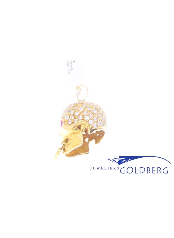 18k gold scull with zirconia