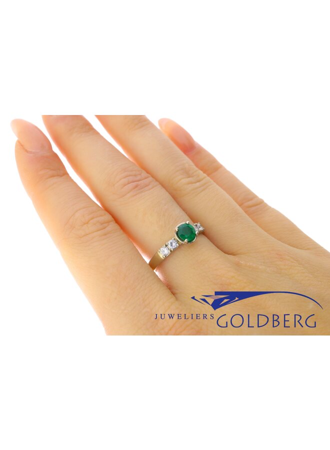 14k white gold "cup ring" with 1x 0.35ct AA emerald & 4x 0.03ct diamond from our workshop