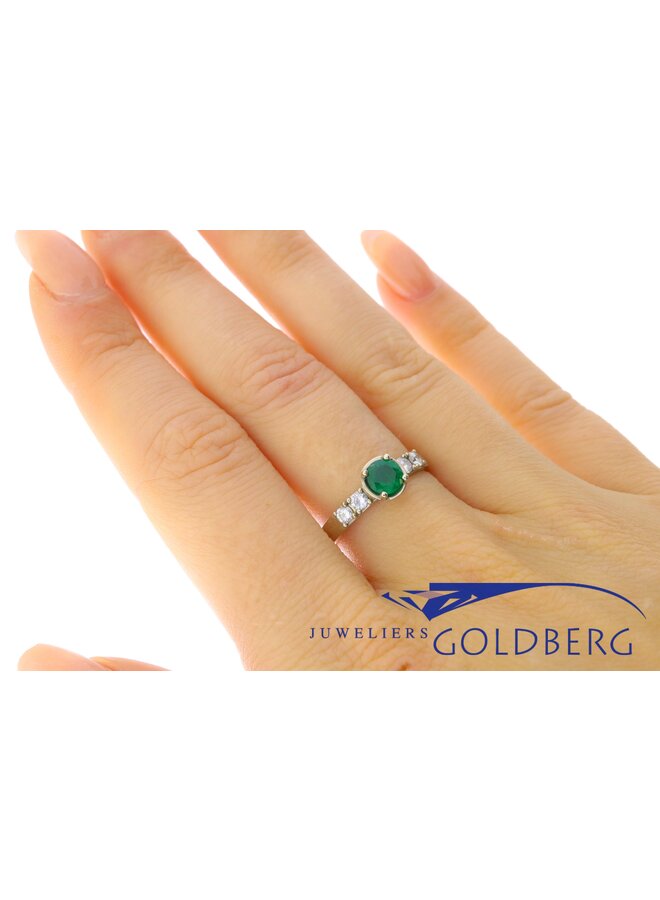 14k white gold "cup ring" with 1x 0.35ct AA emerald & 4x 0.03ct diamond from our workshop