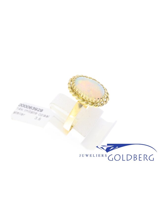 14k gold ring with synthetic opal from our own studio