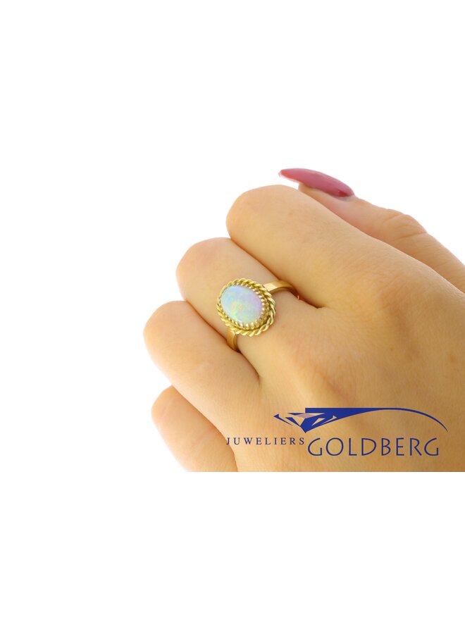 14k gold ring with synthetic opal from our own studio