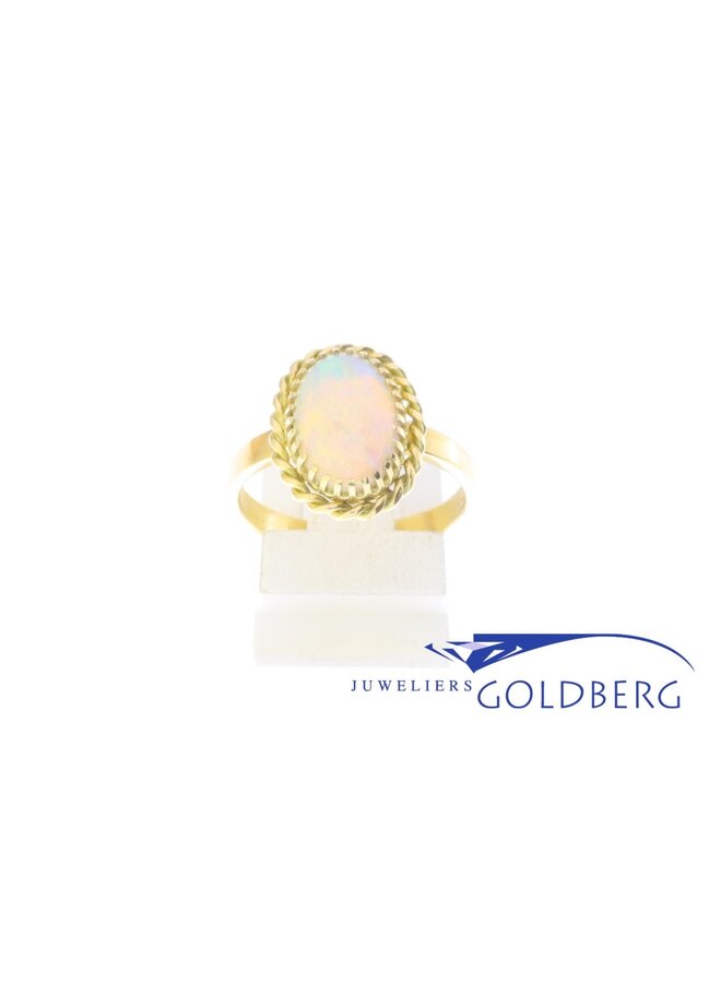 14k gold ring with synthetic opal from our own studio