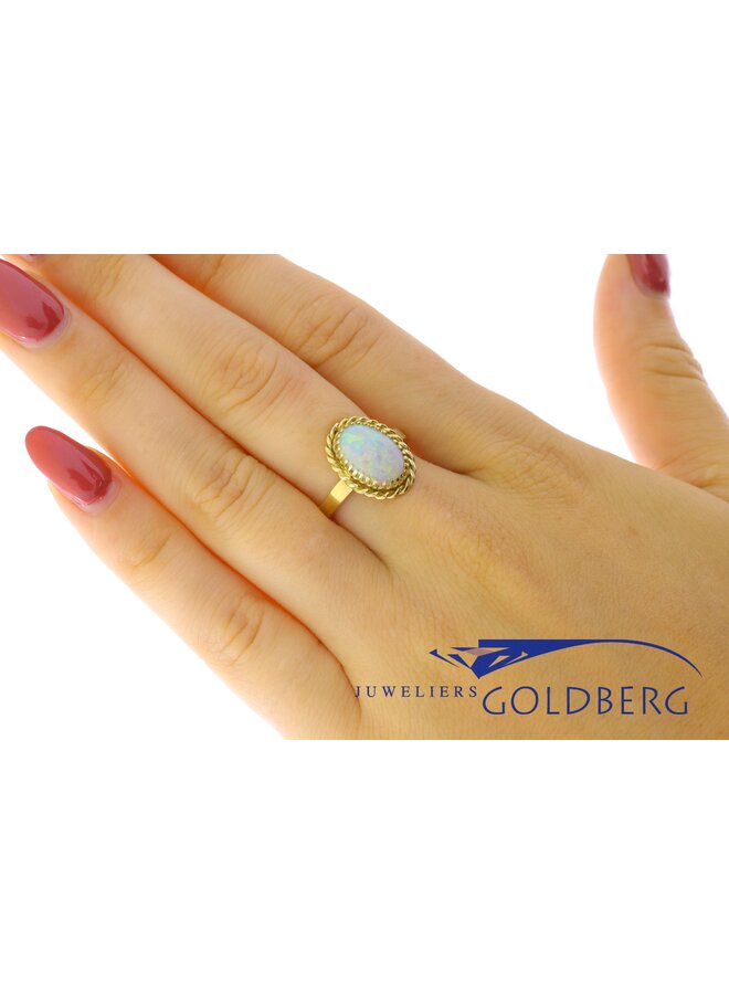 14k gold ring with synthetic opal from our own studio