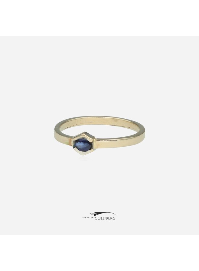 18k white gold ring with sapphire from our own studio