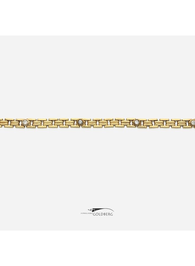 14k gold fantasy bracelet with 5x 0.10ct brilliant cut diamonds