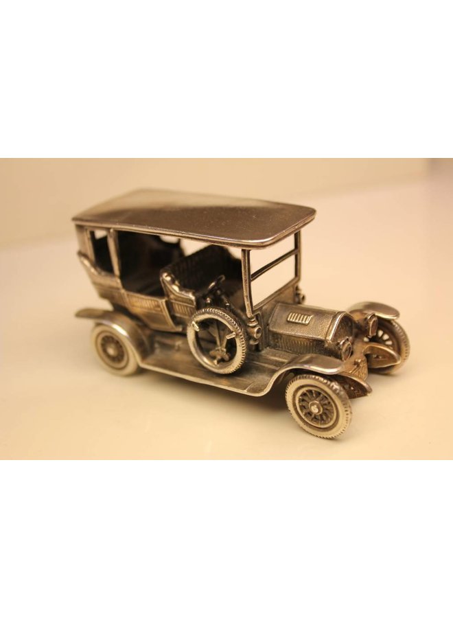 Silver miniature historic car