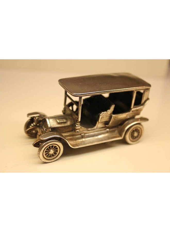 Silver miniature historic car