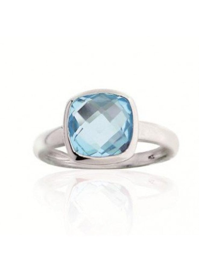 Silver ring set with princess cut blue topaz