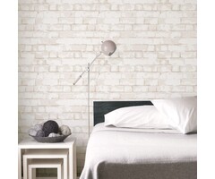 Behang zandkleurige bakstenen muur